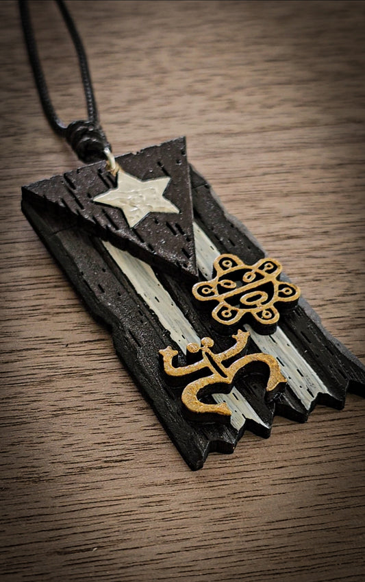 A. Collar de la resistencia con símbolos Taínos "1.25 x "2.5