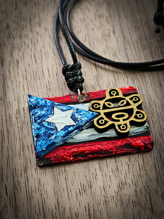 A. Collar con sol Taíno